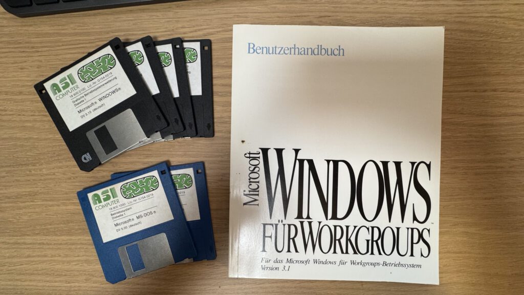 Windows 3.1 floppy disks and handbook